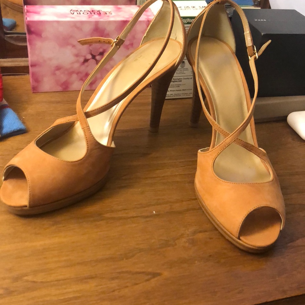 Stuart Weitzman cognac suede heels.